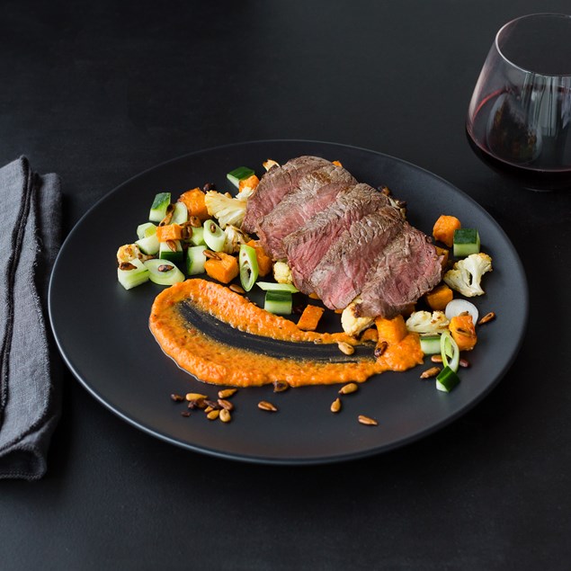 Beef Eye Fillet with Roasted Vegetables and Red Pepper Hummus