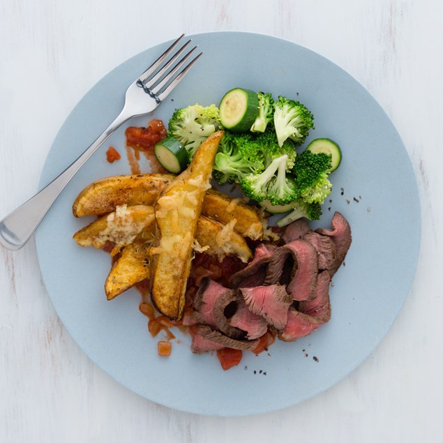 Beef Rump with Cheese Wedges, Tomato Sauce and Greens