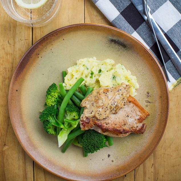 Pork with Creamy Apple Sauce, Potato Rounds and Greens
