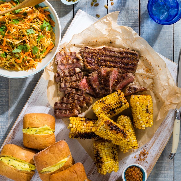 Hickory Beef Steaks with Smoky Corn and Garlic Bread