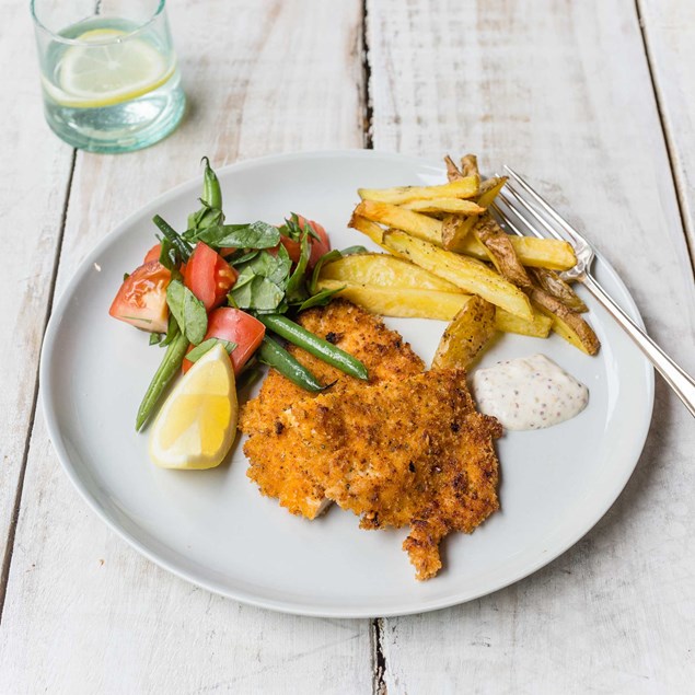 Peri Peri-Crumbed Chicken Schnitzel with Oven Chips, Roast Tomatoes, Beans and Spinach