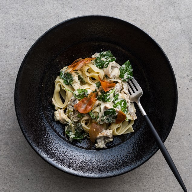 Fresh Tagliatelle with Creamy Truffle Sauce and Prosciutto