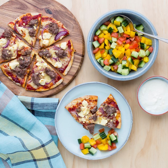 Lamb Pizzas with Yoghurt Drizzle and Greek Salad