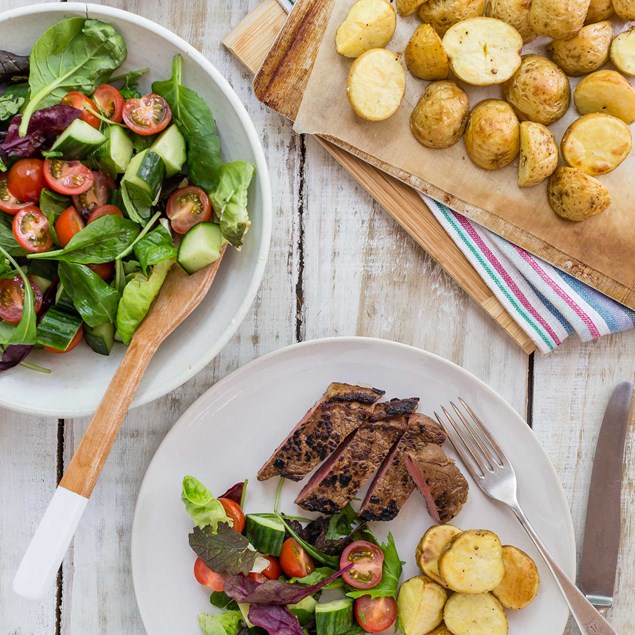 Marinated Steak with Baby Roast Potatoes, Sour Cream and Chives and Chunky Salad