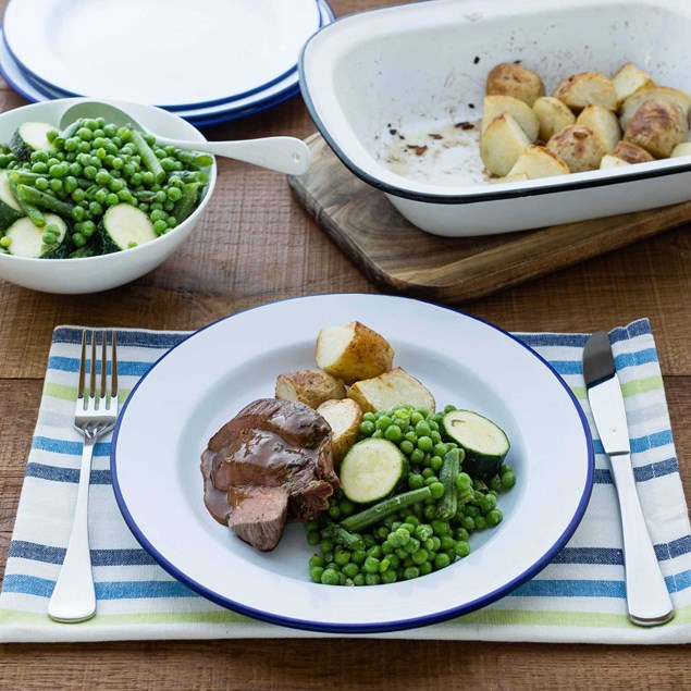 Marinated Butterflied Lamb Leg with Garlic Roasties and Vegetables 