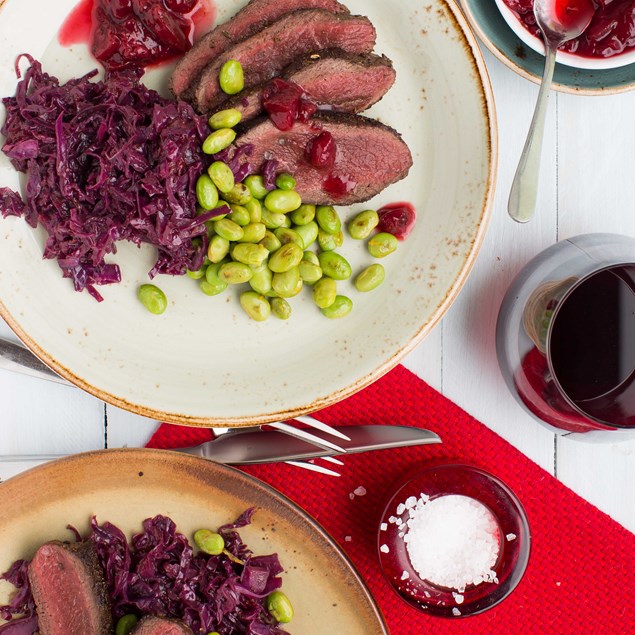 Fennel Crusted Venison Loin with Braised Red Cabbage, Edamame and Plums