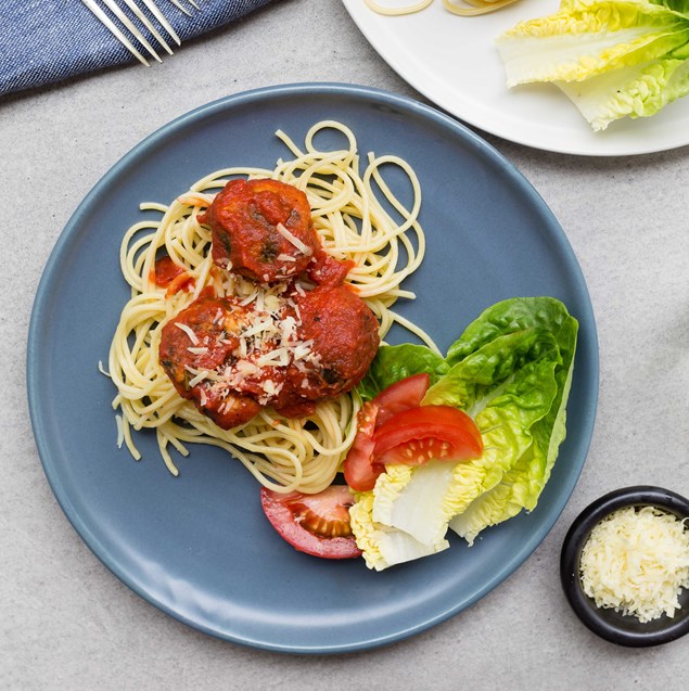 Spinach and Ricotta Balls with Spaghetti and Salad 