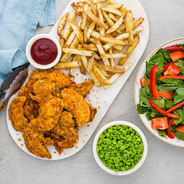 Crumbed Chicken Tenders with Chips, Smashed Peas and Salad